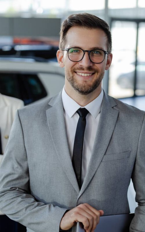 salesteam-in-dealership-three-beautiful-consultants-or-managers-in-elegant-suit-looking-on-camera-.jpg